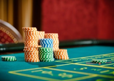 Live dice game table with dealer and clear dice visibility